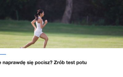 Biegaczka na trawiastym terenie w sloneczny dzien