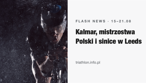 Triathlonista na rowerze czasowym w deszczu
